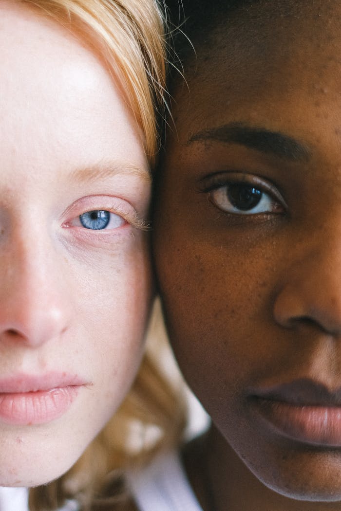 gallery-03 Intimate close-up of two women of different ethnicities showcasing diversity.